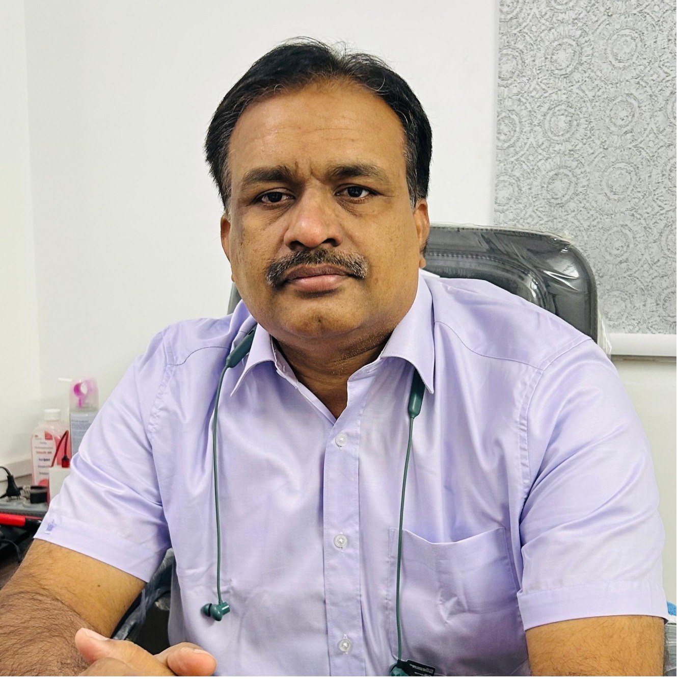 Dr. Suresh